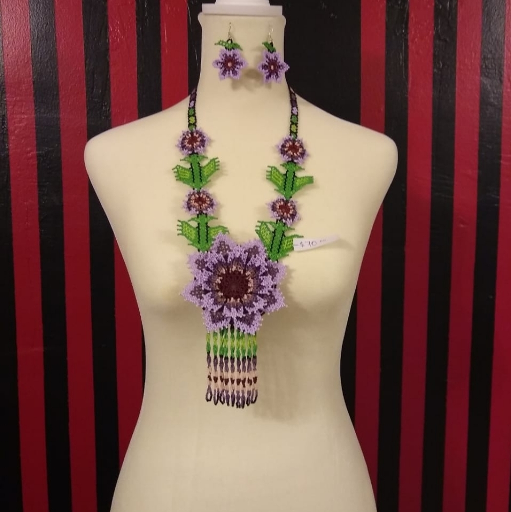 This is a beaded necklace with earrings